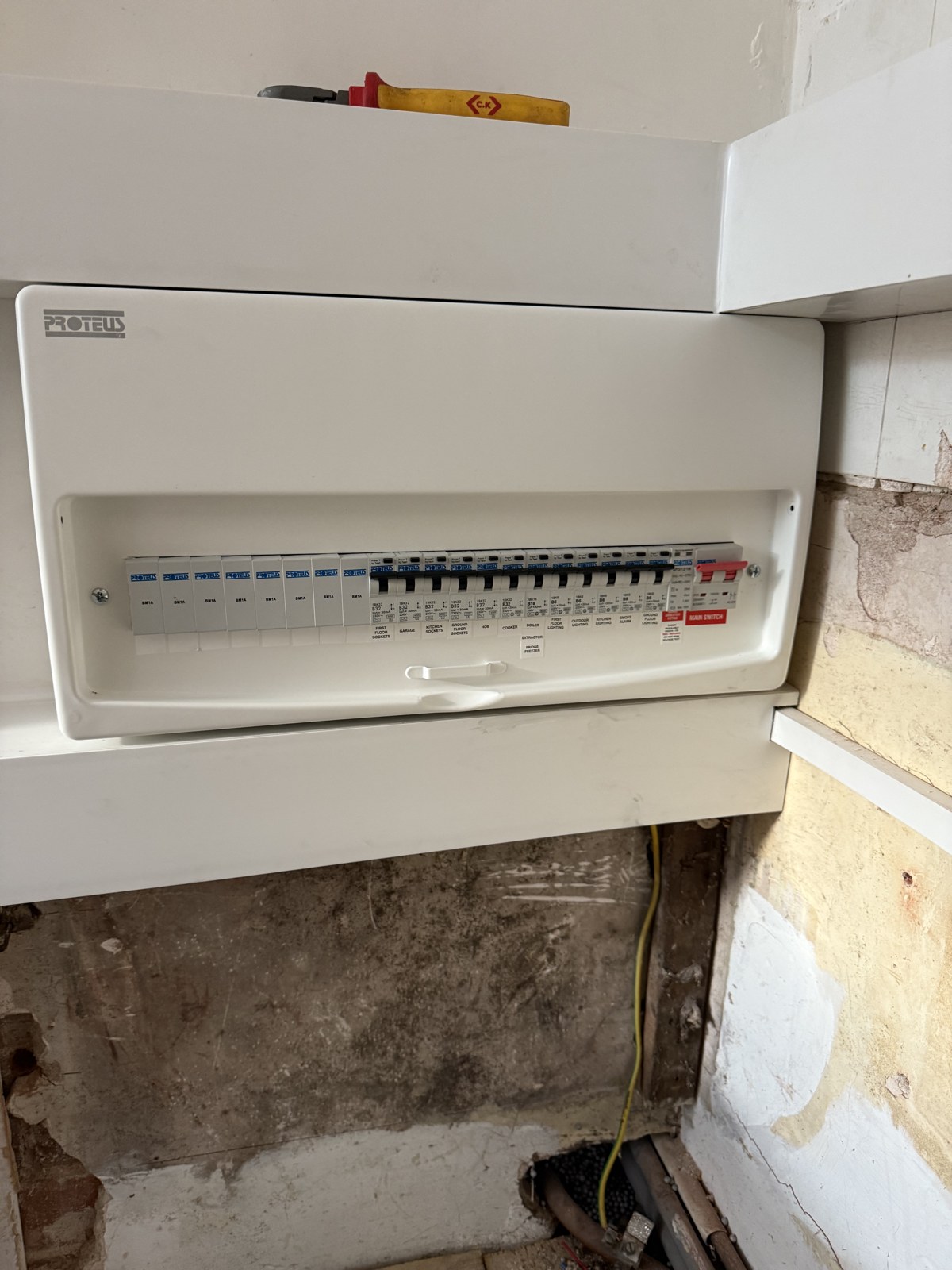Modern 18th Edition metal consumer unit with RCBOs and SPD installed by MP Electrical