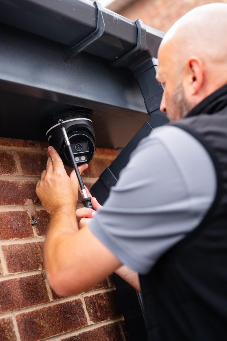 CCTV camera being installed on a house wall by MP Electrical